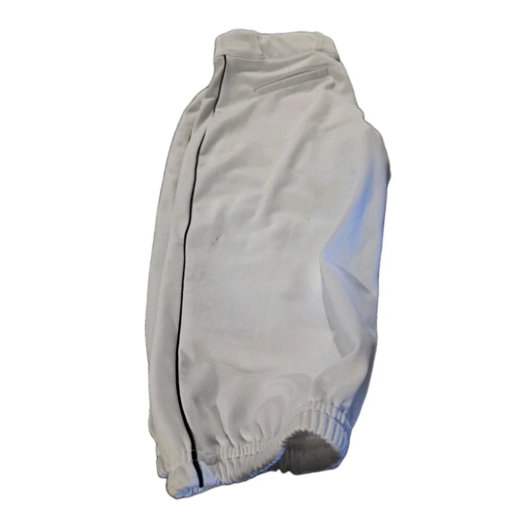 Under Armour branded inner waistband, tunnel belt loops, double snap closure. LG